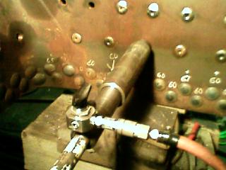 Backing up the staybolts while peening